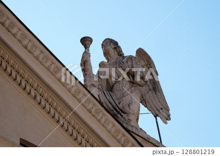 Angel, San Rocco church dedicated to Saint Roch. Founded in 1499 by Pope Alexander VI as the chapel of an adjacent hospital in Rome, Italy. Angel, San Rocco church dedicated to Saint Roch. Founded in 1499 by Pope Alexander VI as the chapel of an adjacent hospital in Rome, Italy. 128801219
