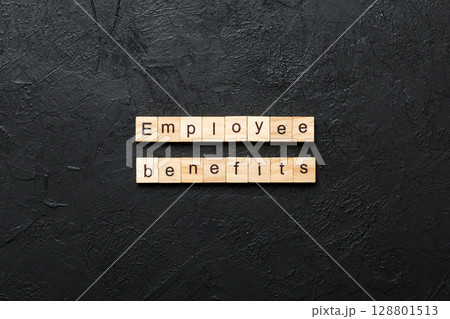 employee benefits word written on wood block. employee benefits text on table, concept 128801513