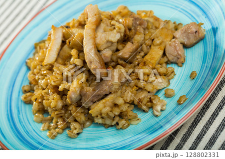 Image of barley porridge with pork roast 128802331