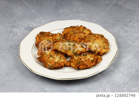 Mucver, Turkish traditional food. (Turkish cuisine) Homemade Food with Zucchini. 128802746