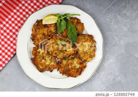 Mucver, Turkish traditional food. (Turkish cuisine) Homemade Food with Zucchini. 128802749