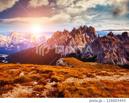 sunset in mountains landscape 128803443