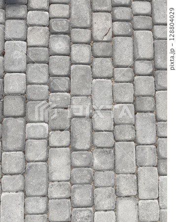 Elegant cobblestone pathway invites calm walks in a serene neighborhood Elegant cobblestone pathway invites calm walks in a serene neighborhood 128804029