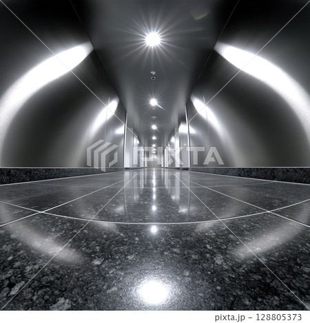 A sleek, modern hallway with a reflective floor and striking lighting design. 128805373