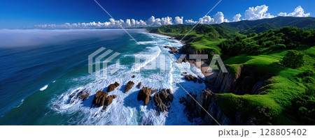 Spectacular coastal landscape featuring a dramatic cliffside and ocean waves. 128805402