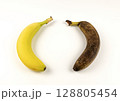 Ripe and overripe bananas isolated on a white background. 128805454