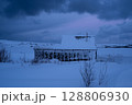 Snow Covered Cabin in Winter Twilight Scene 128806930