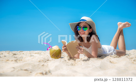 Lifestyle young  woman relax on the summer beach.  Asia tourism 128811372