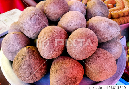 Dry Coconuts for Sale Outside of Hindu Temple Dry Coconuts for Sale Outside of Hindu Temple 128813840