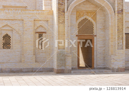 the brick wall background of islam culture in Bukhara, Uzbekistan 128813914