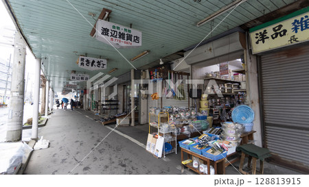 old corner shop is opened in Shinmachi Street or so called Shinmachi-dori. it is the main shopping street in Aomori. old corner shop is opened in Shinmachi Street or so called Shinmachi-dori. it is the main shopping street in Aomori. 128813915