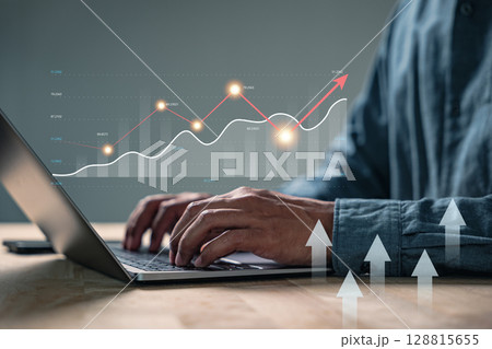Data market growth strategy research plan for a business man using laptop, typing investment data, showing analytics dashboard charts and insights reports for the business financial technology 128815655