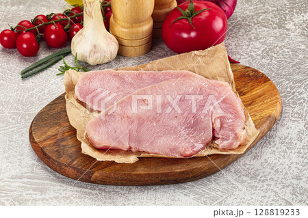 Raw uncooked turkey fillet steak 128819233