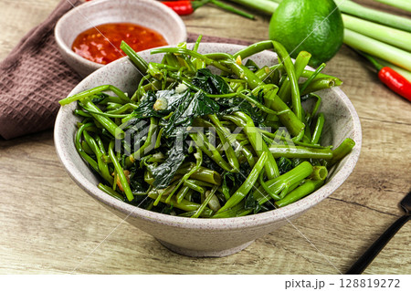 Asian cuisine stir fried morning glory 128819272