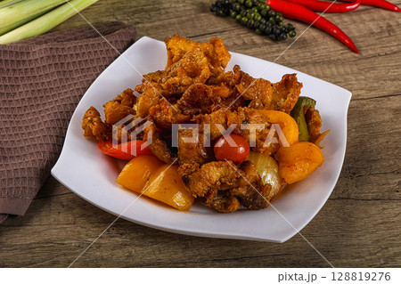 Asian cuisine - roasted crocodile meat Asian cuisine - roasted crocodile meat 128819276
