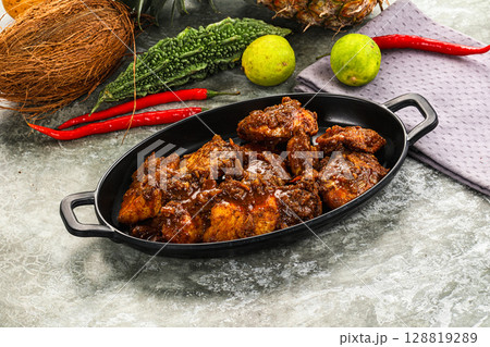 Indian cuisine - Vindaloo fish with spices 128819289