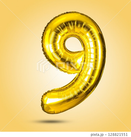 Golden Number Nine Balloon Isolated on Yellow Background for Celebrations and Decor 128821551