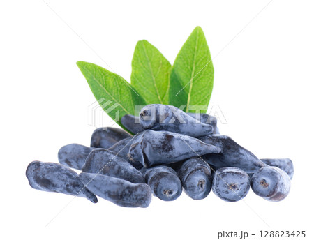 Honeysuckle berry isolated on white background. Fresh honeysuckle blue berry fruits with green leaves. Clipping path. 128823425