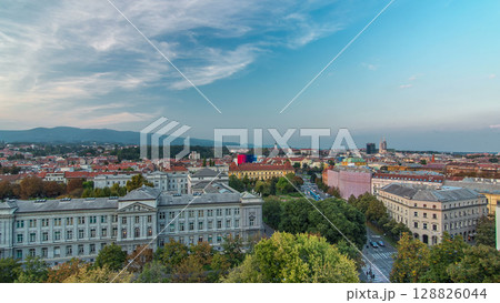 Panorama of the city center day to night timelapse with intersection in front of national theater and museum in Zagreb, Croatia. Panorama of the city center day to night timelapse with intersection in front of national theater and museum in Zagreb, Croatia. 128826044