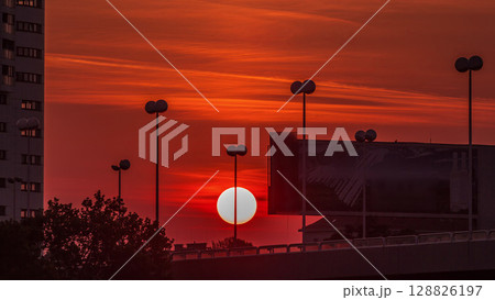 Sunrise near Donaustadt Danube City modern quarter with skyscrapers and business centres timelapse in Vienna, Austria. Sunrise near Donaustadt Danube City modern quarter with skyscrapers and business centres timelapse in Vienna, Austria. 128826197