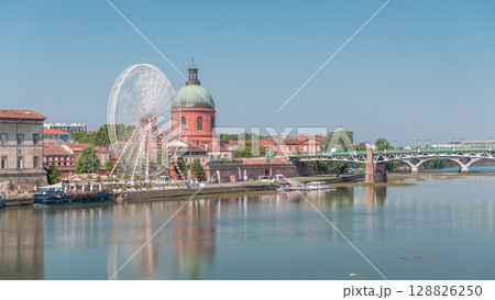 Aerial view of the Garonne River to La Grave Hospital's green dome timelapse hyperlapse. Toulouse, France Aerial view of the Garonne River to La Grave Hospital's green dome timelapse hyperlapse. Toulouse, France 128826250