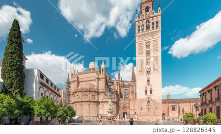Seville Cathedral and Giralda Tower timelapse hyperlapse, Spain 128826345