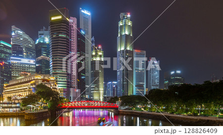 Singapore business district skyscrapers in the night time with water reflections timelapse hyperlapse Singapore business district skyscrapers in the night time with water reflections timelapse hyperlapse 128826409