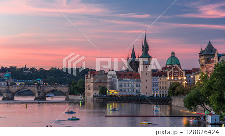 View of the city Prague in Czech Republic day to night timelapse on the Vltava river with beautiful sky 128826424