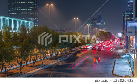 Cityscape aerial night timelapse of Riyadh, Saudi Arabia, King Fahd Road and busy traffic. 128826432
