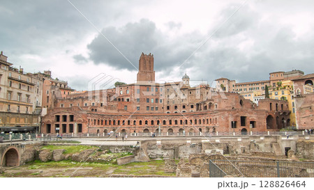 A panoramic view on Trajan's Market timelapse hyperlapse on the Via dei Fori Imperiali, in Rome, Italy 128826464