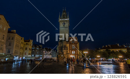 Prague Old Town Hall at Night timelapse hyperlapse with unrecognizable tourists walking 128826591