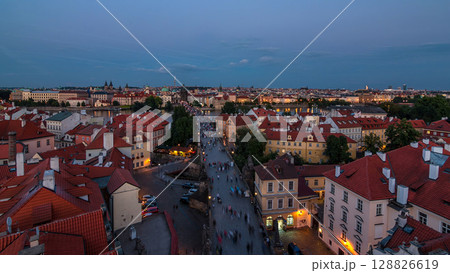 Aerial view of the Old Town architecture and Charles Bridge over Vltava river day to night timelapse in Praha Aerial view of the Old Town architecture and Charles Bridge over Vltava river day to night timelapse in Praha 128826619