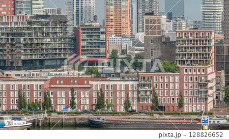 Aerial timelapse of modern buildings in Rotterdam city center, The Netherlands. Aerial timelapse of modern buildings in Rotterdam city center, The Netherlands. 128826652
