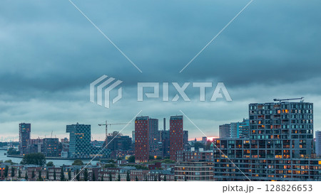 Panoramic aerial day to night timelapse of Katendrecht peninsula and Maashaven harbour in Rotterdam, The Netherlands. 128826653