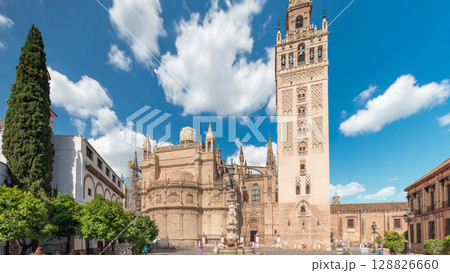 Seville Cathedral and Giralda Tower timelapse hyperlapse, Spain Seville Cathedral and Giralda Tower timelapse hyperlapse, Spain 128826660