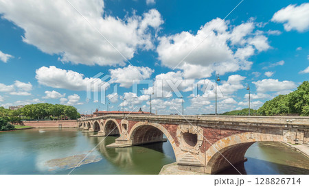 Garonne River and Pont Neuf timelapse hyperlapse in downtown Toulouse, France 128826714