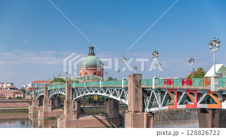 Saint Pierre Bridge over the Garonne River timelapse hyperlapse and La Grave Hospital. Toulouse, France 128826722