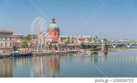 Aerial view of the Garonne River to La Grave Hospital's green dome timelapse hyperlapse. Toulouse, France Aerial view of the Garonne River to La Grave Hospital's green dome timelapse hyperlapse. Toulouse, France 128826723