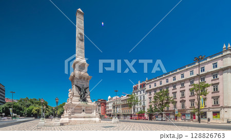 Restauradores Square in Lisbon timelapse hyperlapse. Monument to the Restorers and historical houses around 128826763