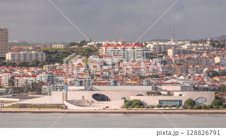 Aerial timelapse of the Champalimaud Foundation's Amphitheatre overlooking the Tagus River in Lisbon, Portugal. 128826791