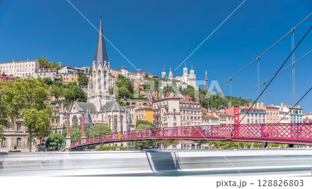 Timelapse hyperlapse of Saint George Church, Quais de Saone, and Fourviere Basilica from a footbridge in Vieux Lyon, France 128826803