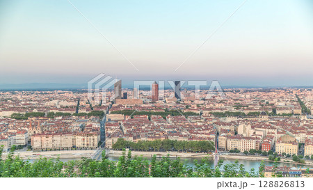 Timelapse panoramic aerial view of Lyon during sunset from Fourviere Hill. France 128826813