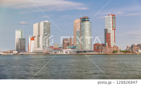 Rotterdam skyline timelapse from Nieuwe Maas River bank to Wilhelminapier and Kop van Zuid 128826847