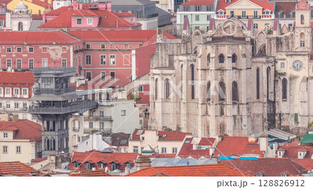 Lisbon from above timelapse: view of Barrio Alto district with Santa Justa Lift and Convento da Ordem do Carmo church. Portugal Lisbon from above timelapse: view of Barrio Alto district with Santa Justa Lift and Convento da Ordem do Carmo church. Portugal 128826912