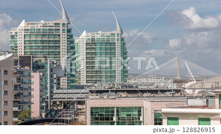 The Parque das Nacoes or Park of Nations modern neighborhood with skyscrapers aerial timelapse in Lisbon. Portugal The Parque das Nacoes or Park of Nations modern neighborhood with skyscrapers aerial timelapse in Lisbon. Portugal 128826915