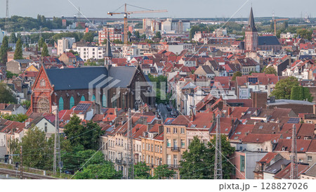 Aerial timelapse panorama of Brussels skyline in Schaerbeek with St. Nicholas Romanian Orthodox Church 128827026