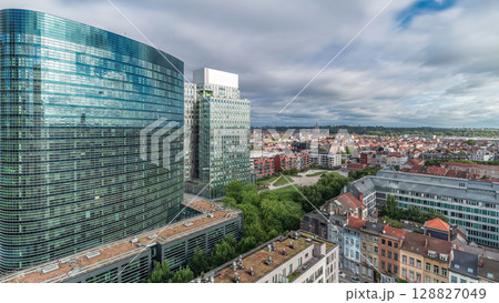 Aerial timelapse of Brussels urban landscape blending office skyscrapers with residential areas. Aerial timelapse of Brussels urban landscape blending office skyscrapers with residential areas. 128827049