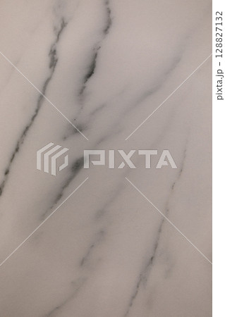 Elegant marble surface with subtle veining showcasing natural beauty and texture for interior design Elegant marble surface with subtle veining showcasing natural beauty and texture for interior design 128827132
