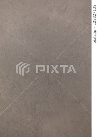 Surface with natural texture and subtle color variations observed in an indoor setting Surface with natural texture and subtle color variations observed in an indoor setting 128827135