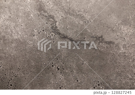 Textured surface showing intricate patterns of a gray material, ideal for interior design and Textured surface showing intricate patterns of a gray material, ideal for interior design and 128827245